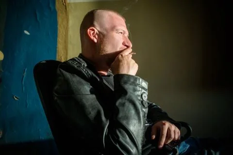 Man smoking cigarette Stock Photos