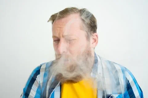 Man smoking cigarette Stock Photos