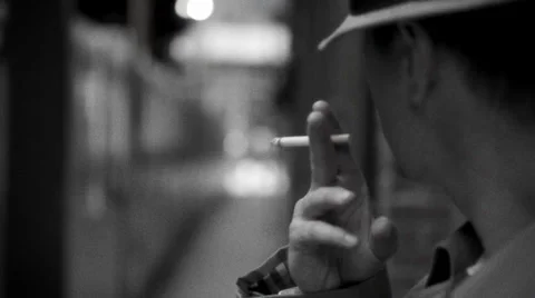 Man Smoking A Cigarette At A Train Station 動画素材 27235906
