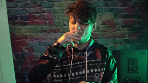 Man Smoking Cigarette While Working on Computer From 1980's, Programming or Stock Footage 301281069