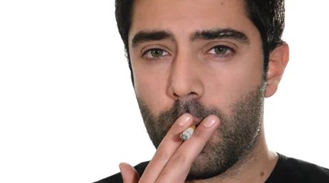Man smoking a cigarette on white Stock Footage 32808803