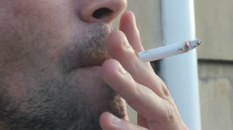 Man smoking- close up Stock Footage