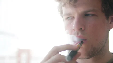 Man smoking e-cigarette Stock Footage 40622781