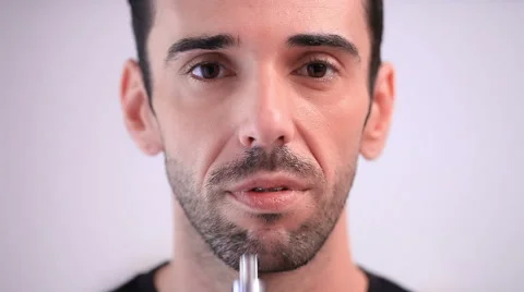 Man smoking an e-cigarette Video stock 57678804