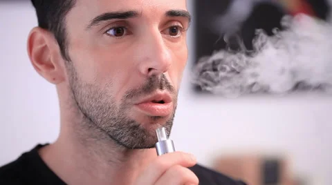 Man smoking an e-cigarette Stock-Footage 57690165