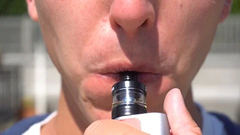 Man Smoking Electronic Cigarette, Close Up Stock Footage 106095056