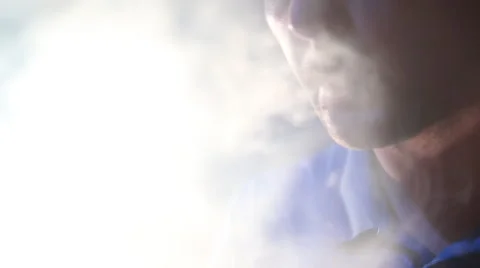 Man smoking electronic cigarette Stock Footage 66683381