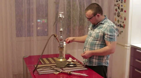 A man smoking a hookah Video stock 59582233
