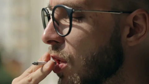 Man smoking a joint Video stock 95039427