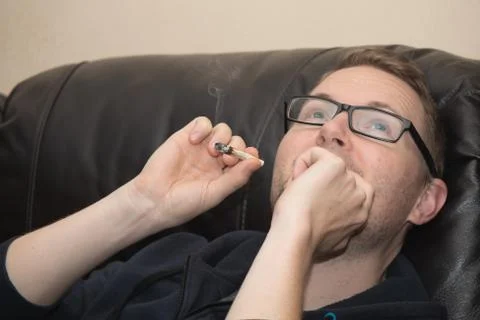 Man smoking joint getting creative ideas 스톡 사진
