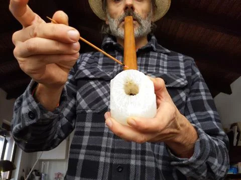Man smoking an old pipe Stock Photos