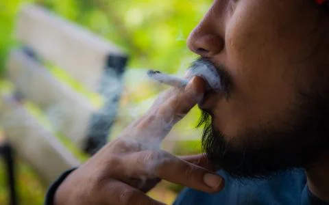 The man smoking Stock Photos