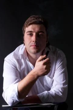 Man smoking a pipe Stock Photos
