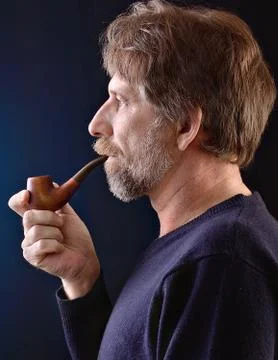 Man smoking a pipe Foto stock