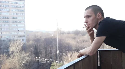 Man smoking rooftop Video stock 62221004