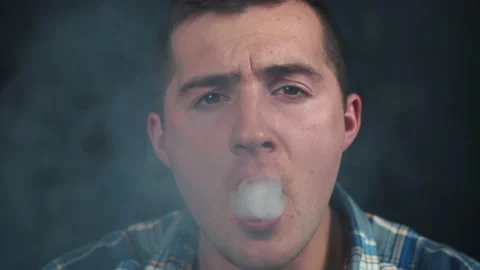 Man smoking vape close up Stock Footage 144437406