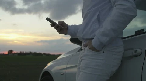 Man sms texting on smart phone Stock Footage 67876031