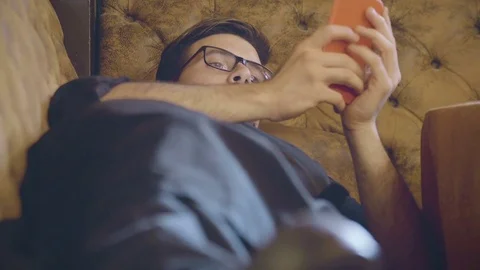 Man sms texting using app on smartphone Stock Footage 73747128