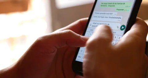Man Sms Texting Using App On Smart Phone whastapp and communication apps online  Stock Footage 91938903