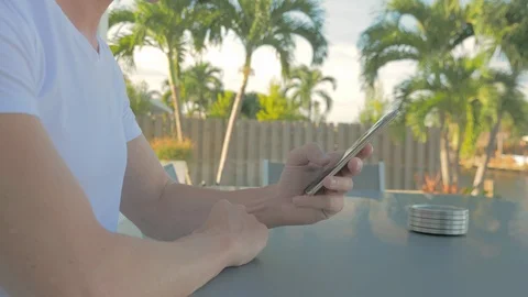 Man sms texting using app on smartphone Stock Footage 95039328
