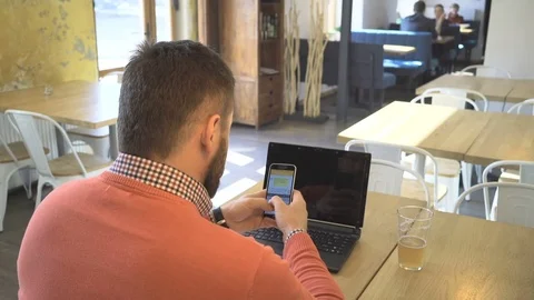 Man sms typing, using app on smartphone, writing, close behaind shot Vídeo Stock 73293017