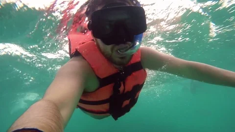 Man Snorkeling in Slow Motion Stock Footage 73836408