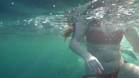 Man snorkeling underwater and exploring coral reef in Budva Montenegro Stock Footage 339069426