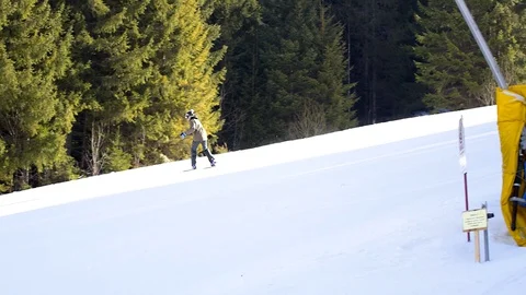 Man on a snowboard on the hill Stock Footage 129291545