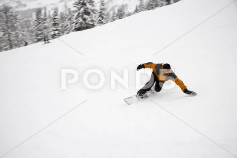 Man Snowboarding, Banff National Park, Alberta, Canada