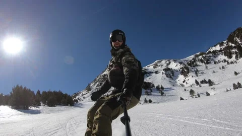 Man snowboarding on the ski slope Stock Footage 171237209
