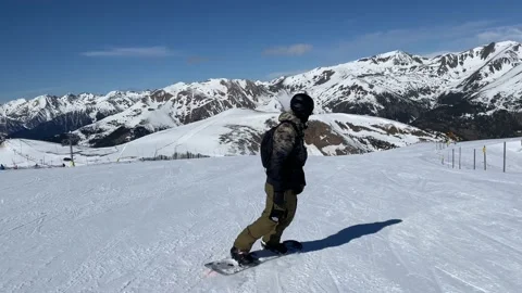 Man snowboarding on the slope Stock Footage 171228046