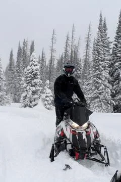 Man Snowmachine, sledding Stock Photos