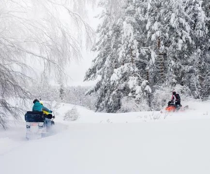 Man on snowmobile Stock Photos