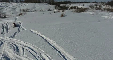 Man on snowmobile in winter mountain man Stock Footage 87944095