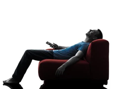 Man sofa couch remote control sleeping watching tv Stock Photos