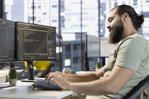 Man in software engineer office position analyzing data 스톡 사진