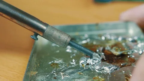 The man solders a chip Stock Footage 70601241