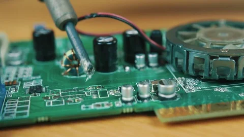 The man solders a chip Stock Footage 70602004