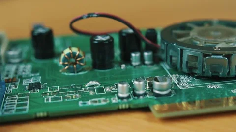 The man solders a chip Stock Footage 70602495