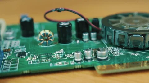 The man solders a chip Stock Footage 70602547