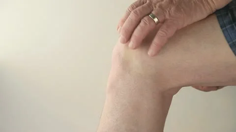 Man with a sore knee Stock Footage 10818564