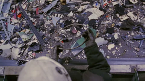 Man sorts garbage, electronics or plastic. Waste recycling plant or garbage Video stock 276498959
