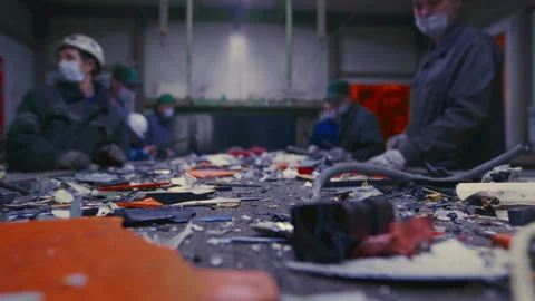 Man sorts garbage, electronics or plastic. Waste recycling plant or garbage Video stock 277063893