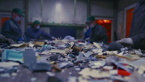 Man sorts garbage, electronics or plastic. Waste recycling plant or garbage Video stock 307640955