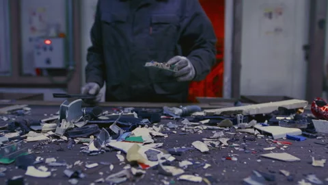 Man sorts garbage, electronics or plastic. Waste recycling plant or garbage Video stock 319202612