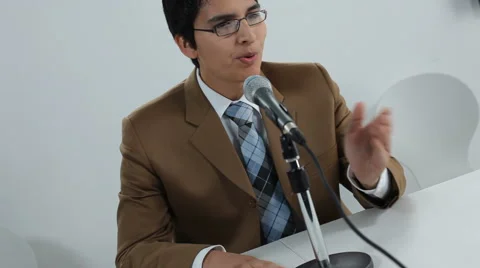 Man speaking into microphone Stock-Footage 61668679