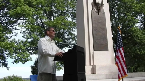 Man speaking on a podium 動画素材 55196388
