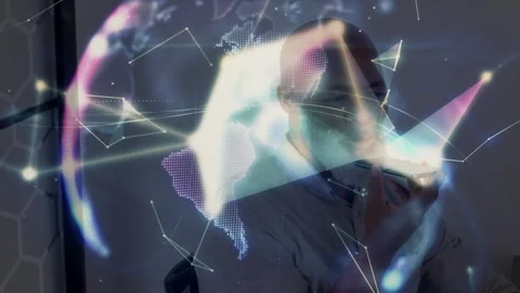 Man speaking into smartphone initiating tech demo with glowing network forming Stock Footage 315558123