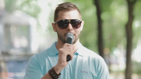 Man speaks into a microphone Stock Footage 23890246