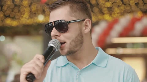 Man speaks into a microphone Stock Footage 23891165